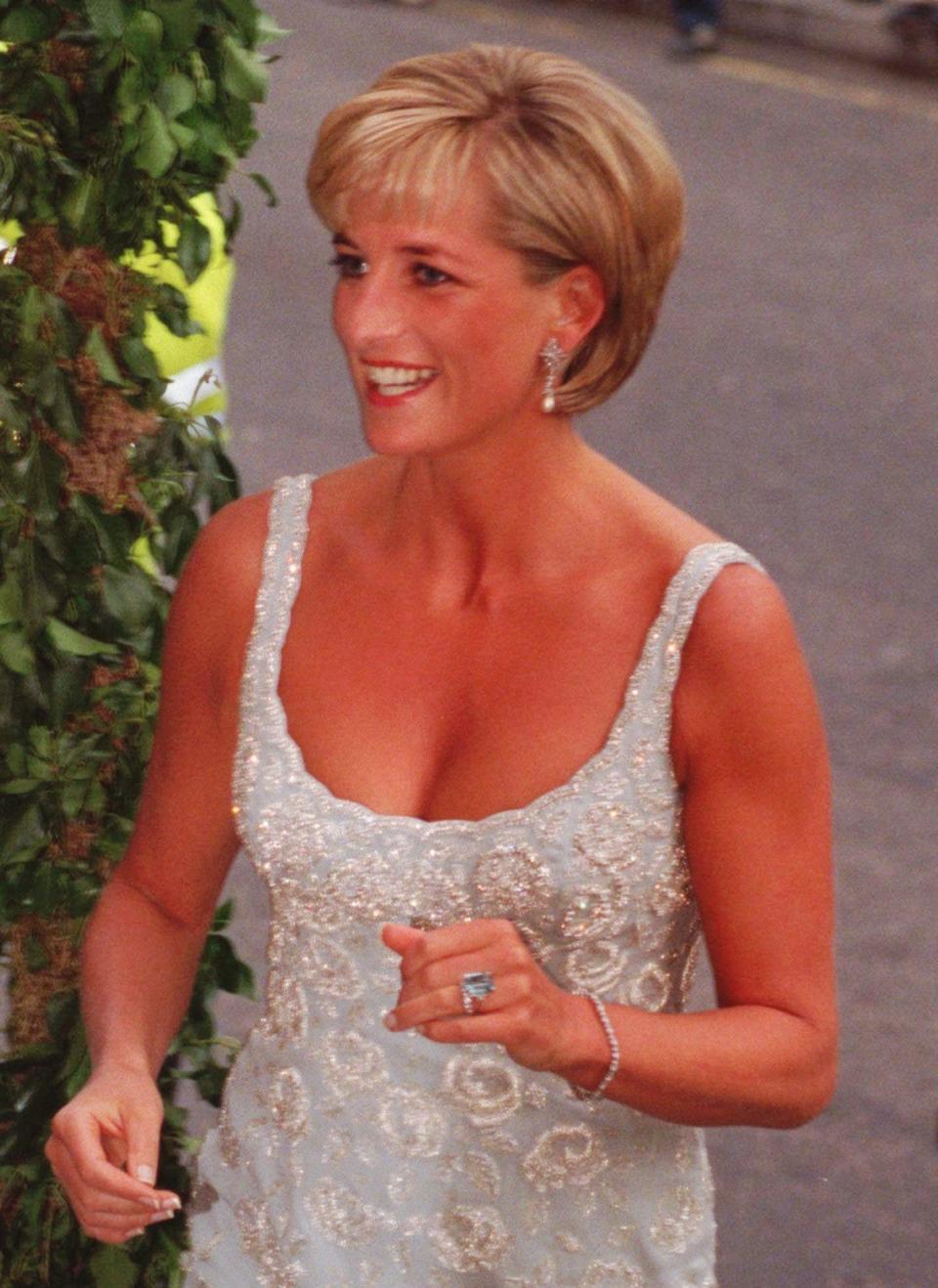 Princess Diana wears an aquamarine ring in 1997.