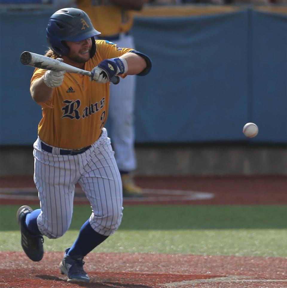 Angelo State University's Jordan Williams lays down a bunt against West Texas A&M in the Lone Star Conference Baseball Tournament finals at Foster Field at 1st Community Credit Union Stadium on Saturday, May 14, 2022.
