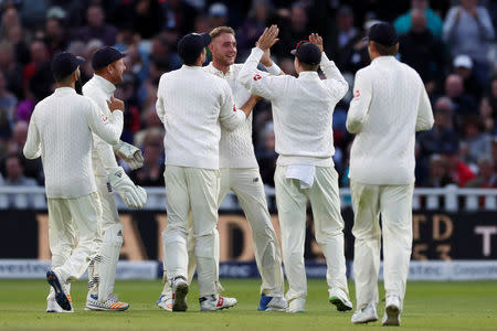 Cricket - England vs West Indies - First Test - Birmingham, Britain - August 19, 2017 England's Stuart Broad celebrates the wicket of West Indies' Jason Holder Action Images via Reuters/Paul Childs