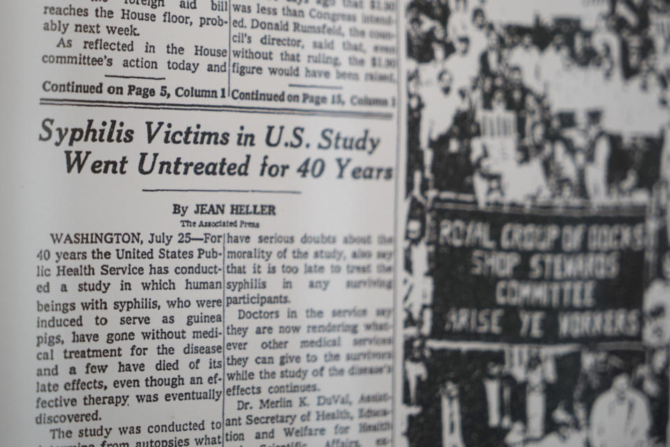 A copy of former Associated Press investigative reporter Jean Heller's story printed on the front page of The New York Times hangs on a wall of her home in Southport, N.C., on Saturday, July 9, 2022. In July 1972, Heller broke the story about the U.S. Public Health Service study in which Black men in Alabama went untreated for syphilis so researchers could document the disease's effects. (AP Photo/Allen G. Breed)