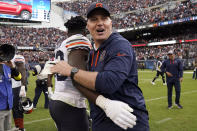 Chicago Bears coach Matt Eberflus, right, celebrates with Nicholas Morrow (53) after an NFL football game against the Houston Texans Sunday, Sept. 25, 2022, in Chicago. The Bears won 23-20. (AP Photo/Nam Y. Huh)