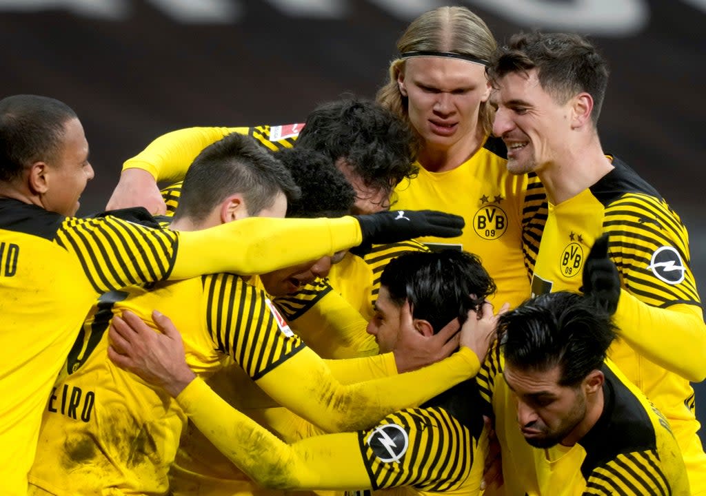 Dortmund celebrated a memorable Bundesliga win over Eintracht Frankfurt after recovering from 2-0 down (Michael Probst/AP) (AP)