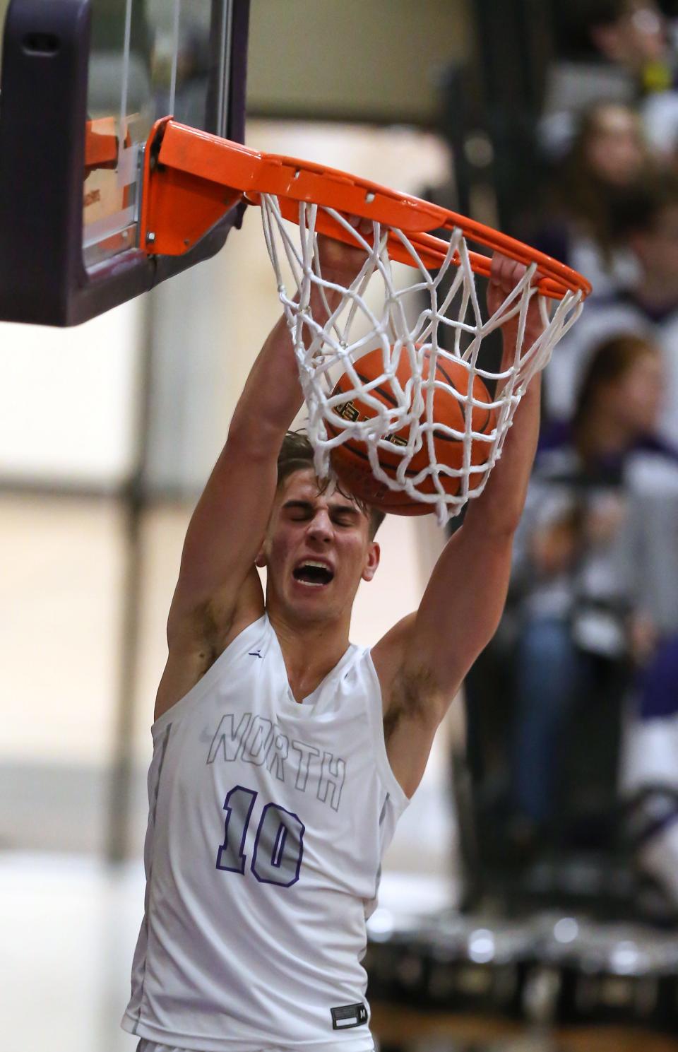 North Kitsap’s Cade Orness dunks the ball during their 79-52 win over Bainbridge on Friday, Jan 19, 2024.