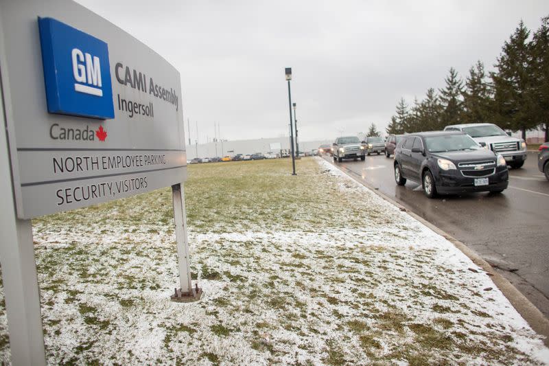 FILE PHOTO: Workers leave the General Motors CAMI car assembly plant where the GMC Terrain and Chevrolet Equinox are built in Ingersoll