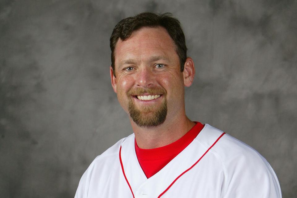<p>Jed Jacobsohn/Getty</p> Dave McCarty of the Boston Red Sox poses for a photo in February 2004