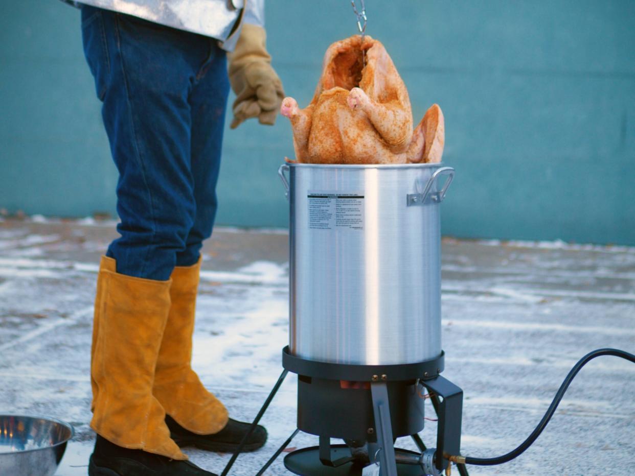 Deep Frying Turkey in Hot Oil for Christmas and Thanksgiving