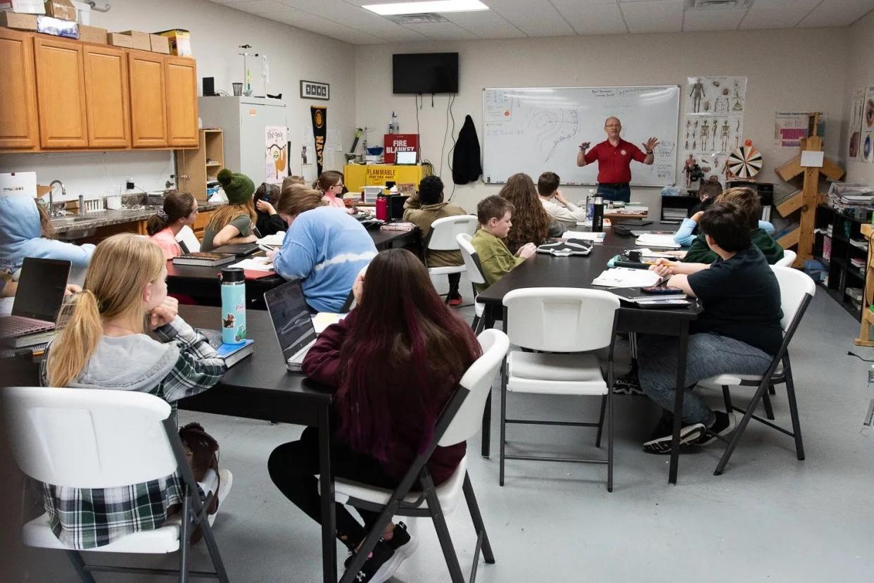 Guy Holland taught his seventh graders about hurricanes during a science class on Jan. 11, 2023, at Lawton Academy for Arts and Sciences, a private school in a warehouse district.