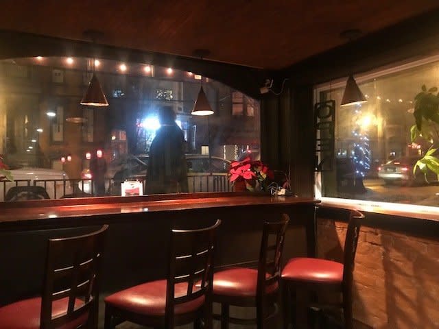 Inside the bar of Justin's.