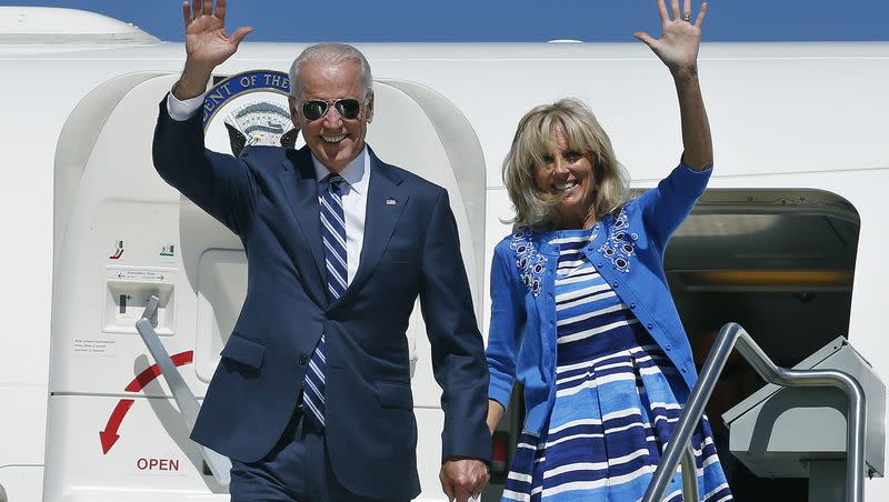 Then-Vice President Joseph Biden, left, walks from Air Force Two with his wife, Jill Biden, upon arrival at Denver International Airport, Tuesday May 27, 2014, in Denver.