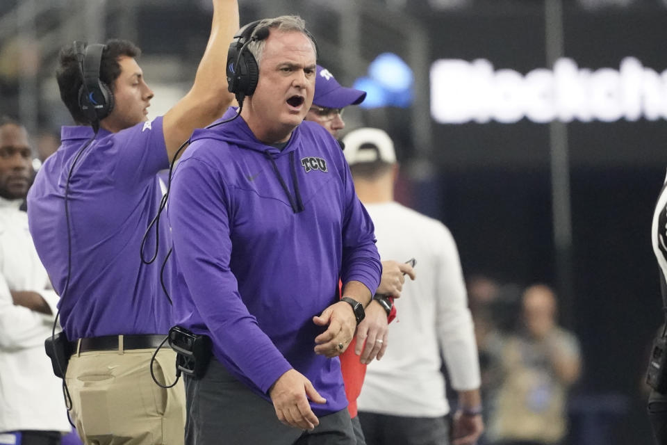 TCU head coach Sonny Dykes shouts from the sidelines in the first half of the Big 12 Conference championship NCAA college football game against Kansas State, Saturday, Dec. 3, 2022, in Arlington, Texas. (AP Photo/LM Otero)