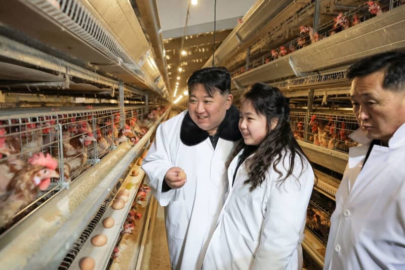 A picture released by the North Korean state news agency (KCNA) on 08 January 2024 shows Kim Jong Un, North Korea's ruler, visiting the Kwangcheon Poultry Farm in North Hwanghae Province, with his daughter. -/KCNA/KNS/dpa