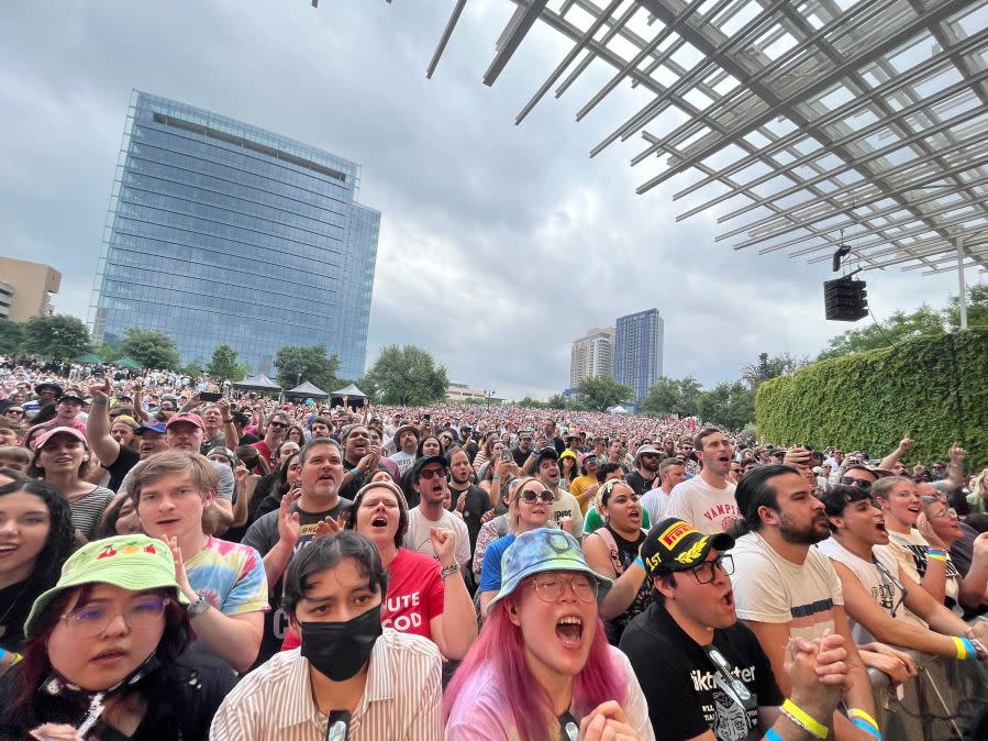 Concertgoers enjoy a performance from Vampire Weekend during the eclipse at Moody Amphitheater on April, 8, 2024. (KXAN Photo/Avery Travis)