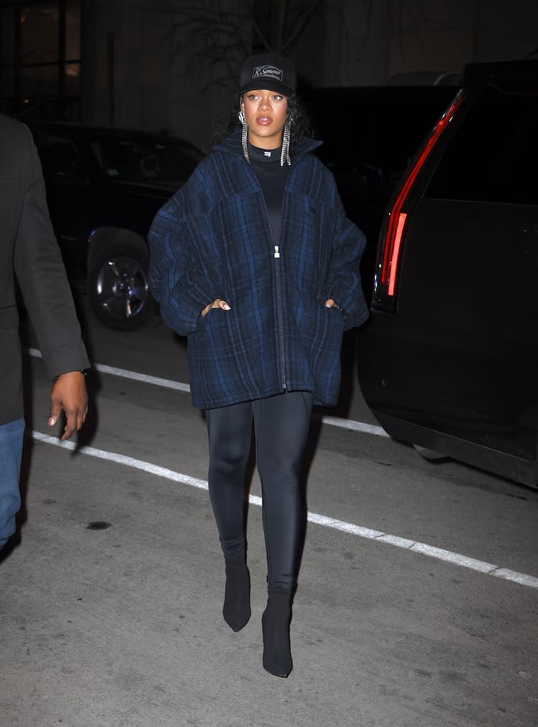 Rihanna out and about in a plaid jacket and black boots in NYC on Jan. 25, 2022. - Credit: WavyPeter / SplashNews.com