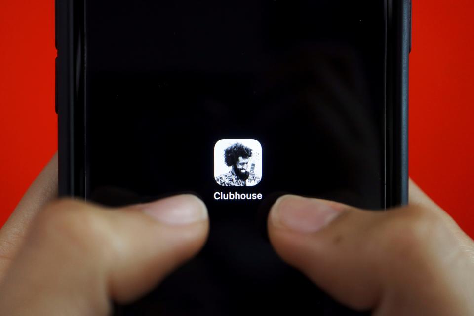 Clubhouse audio app Reuters February 2021 fingers iPhone.JPG