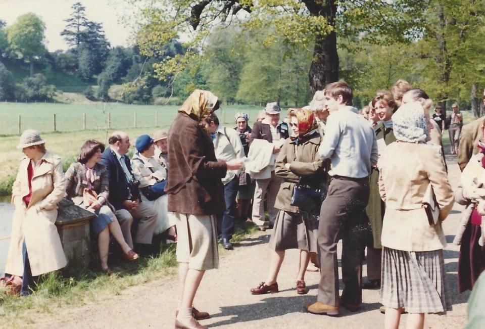 Bucks County Philanthropist Gene Epstein and his family visited England in 1980 as he and his wife, Marlene, were with the United States Equestrian Team participating in the Windsor International Horse Show. Here Queen Elizabeth II (smaller woman in center of photo) meets with the group, including Marlene Epstein (seated second on left).