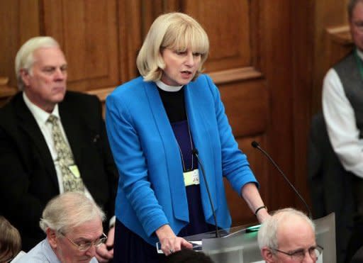 Rosie Harper, vicar of Great Missenden, addresses the Church of England General Synod at Church House in central London. The Church of England's draft legislation approving women bishops failed to pass its governing body the General Synod by a razor-thin margin on Tuesday