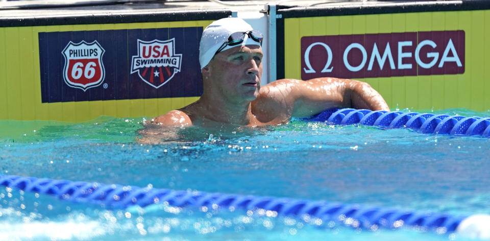 Ryan Lochte looks on after competing in the men's 200-meter individual medley time trial at the U.S. national swimming championships in Stanford, Calif., Wednesday, July 31, 2019. Lochte is returning from a 14-month suspension. (AP Photo/David J. Phillip)