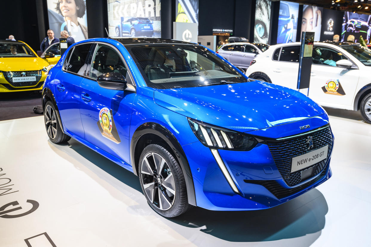 BRUSSELS, BELGIUM - JANUARY 09: Peugeot e-208 all electric compact hatchback car on display at Brussels Expo on JANUARY 09, 2020 in Brussels, Belgium. The Peugeot 208 is available with various petrol and diesel engines and as full electric e-208.  (Photo by Sjoerd van der Wal/Getty Images)