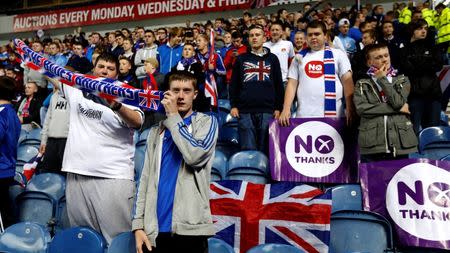 Rangers fans display No Thanks posters during the Rangers versus Inverness Caledonian Thistle soccer match in Glasgow, Scotland, September 16, 2014.REUTERS/Russell Cheyne