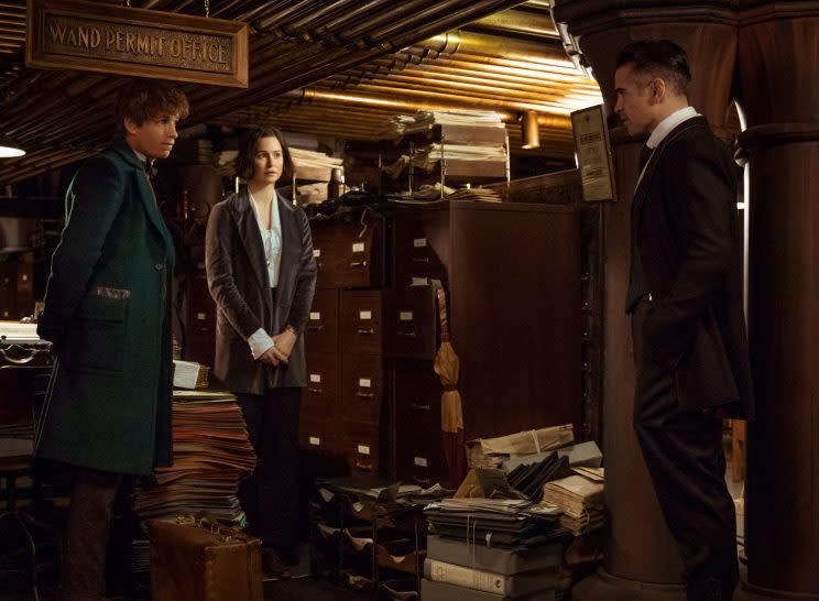 Newt Scamander (Eddie Redmayne) and Tina Goldstein (Katherine Waterston) get scolded by Percival Graves (Colin Farrell) at MACUSA HQ (Photo: Warner Bros.)