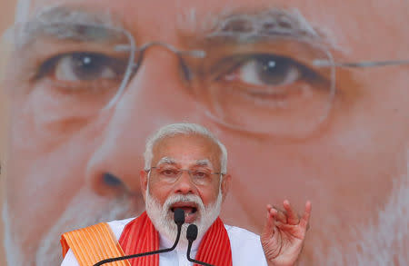 India's Prime Minister Narendra Modi addresses his supporters during an election campaign rally in Patan, Gujarat, April 21, 2019. REUTERS/Amit Dave