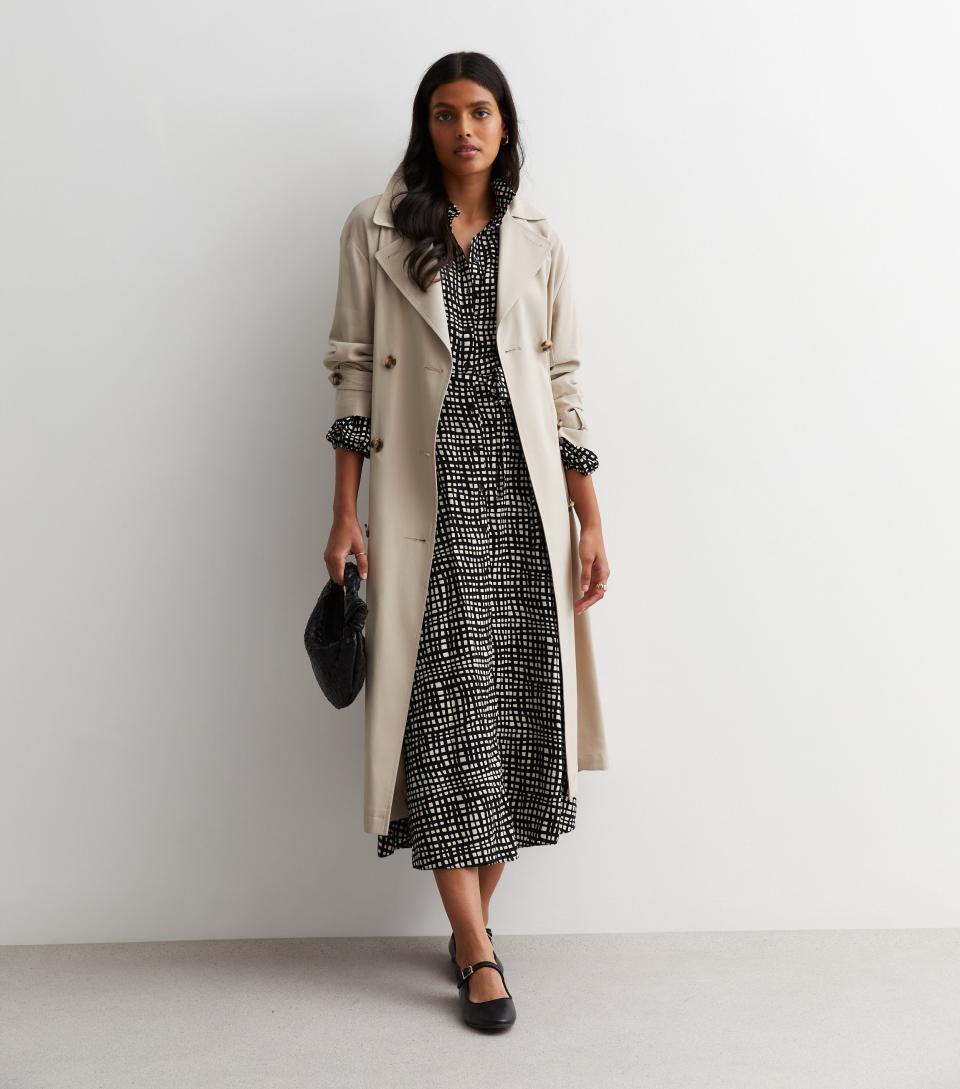 Belted midi dress from New Look with a trench coat on top. 