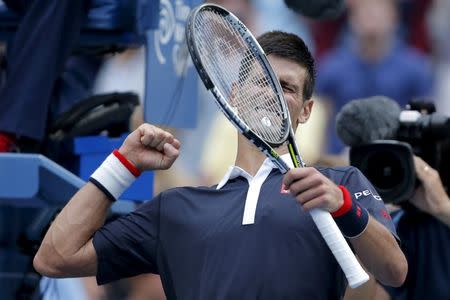 Novak Djokovic of Serbia celebrates after defeating Andreas Seppi of Italy in their third round match at the U.S. Open Championships tennis tournament in New York, September 4, 2015. REUTERS/Eduardo Munoz