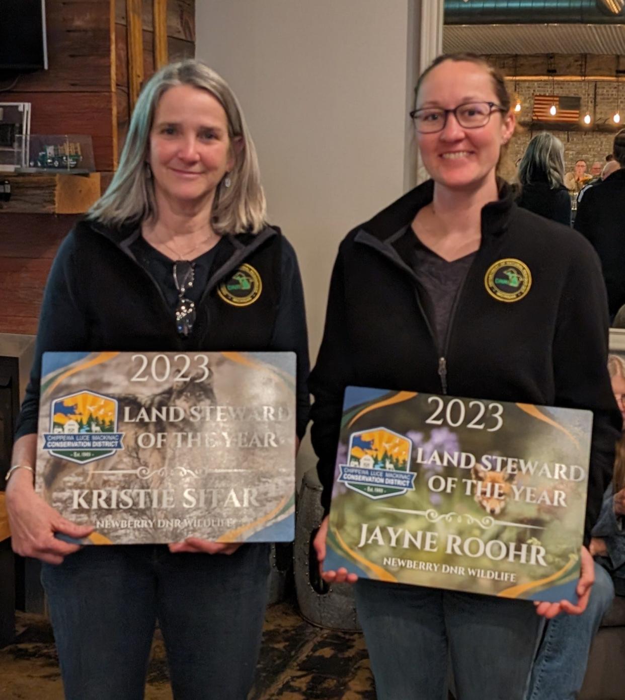 Kristie Sitar and Jayne Roohr received the 2023 Land Steward of the Year award at the Chippewa Luce Mackinac Conservation District annual meeting.