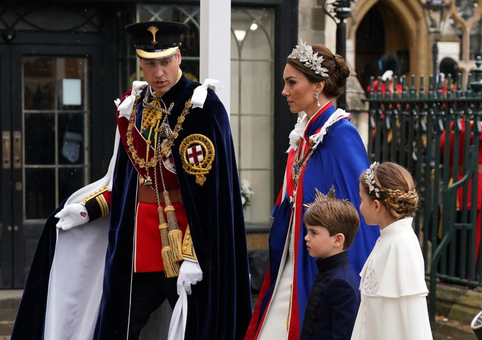 Britain's Prince William, Prince of Wales, Britain's Catherine, Princess of Wales, Britain's Princess Charlotte of Wales and Britain's Prince Louis of Wales arrive at Westminster Abbey in central London on May 6, 2023, ahead of the coronations of Britain's King Charles III and Britain's Camilla, Queen Consort. - The set-piece coronation is the first in Britain in 70 years, and only the second in history to be televised. Charles will be the 40th reigning monarch to be crowned at the central London church since King William I in 1066. Outside the UK, he is also king of 14 other Commonwealth countries, including Australia, Canada and New Zealand. Camilla, his second wife, will be crowned queen alongside him, and be known as Queen Camilla after the ceremony. (Photo by Andrew Milligan / POOL / AFP) (Photo by ANDREW MILLIGAN/POOL/AFP via Getty Images)