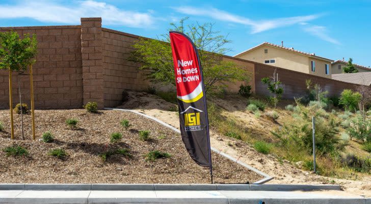 Located in the Mojave Desert City of Victorville, California, a feather flag sign for LGI Homes with text of New Homes - 0% Down. (LGIH)