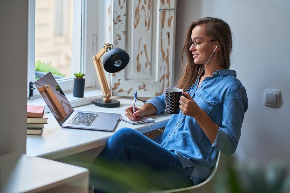 Remote work offers affordability, but at the cost of your career path. Goffkein – stock.adobe.com