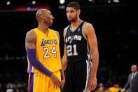<p>2012: Tim Duncan #21 of the San Antonio Spurs and Kobe Bryant #24 of the Los Angeles Lakers share a laugh while playing on November 13, 2012 at the Staples Center in Los Angeles, California. </p>