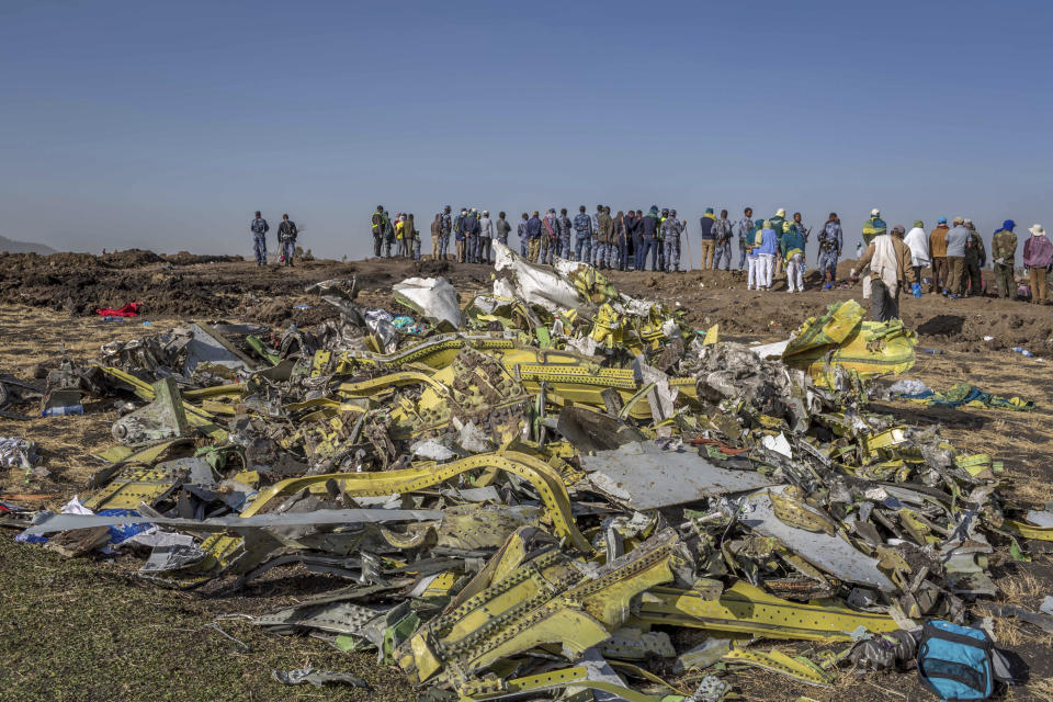 FILE - In this March 11, 2019, file photo, wreckage is piled at the crash scene of an Ethiopian Airlines flight crash outside Addis Ababa, Ethiopia. Ethiopian Airlines’ former chief engineer Yonas Yeshanew, who is seeking asylum in the U.S., says in a whistleblower complaint filed with regulators that the carrier went into maintenance records on a Boeing 737 Max jet after it crashed this year, a breach he contends was part of a pattern of corruption that included routinely signing off on shoddy repairs. (AP Photo/Mulugeta Ayene, File)