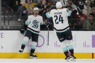 Seattle Kraken right wing Jordan Eberle, left, celebrates after scoring against the Vegas Golden Knights during the second period of an NHL hockey game Friday, Nov. 25, 2022, in Las Vegas. (AP Photo/John Locher)