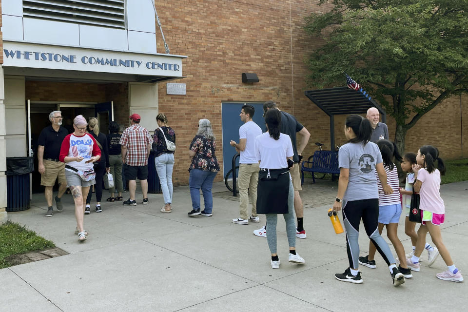 Despite nearly a month of early voting with record turnout numbers, a long line of Columbus, Ohio residents grows outside Whetstone Community Center, Tuesday, Aug. 8, 2023 in Columbus, Ohio. It’s the final day that Ohio citizens can vote in a GOP-rushed special election on whether to make the state constitution harder to amend, likely having direct impact on abortion rights in the state. (AP Photo/Samantha Hendrickson)