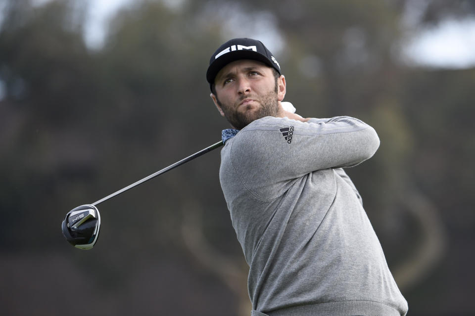 Jon Rahm of Spain hits his tee shot on the 14th hole of the South Course at Torrey Pines Golf Course during the third round of the Farmers Insurance golf tournament Saturday, Jan. 25, 2020, in San Diego. (AP Photo/Denis Poroy)