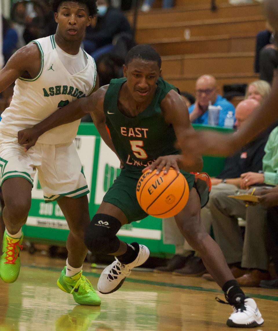 East Lincoln's Jeremiah Jones works through traffic during his team's win at Ashbrook on Dec. 1, 2021.