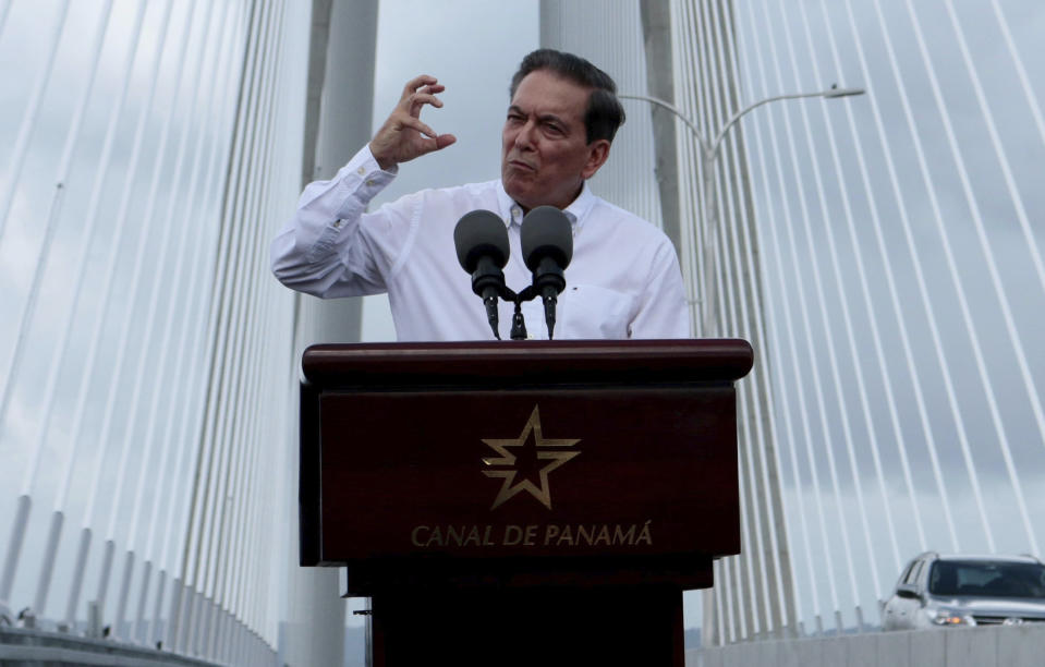 Panama's President Laurentino Cortizo speaks during the opening of the new bridge that spans the Panama Canal, in Colon, Panama, Friday, August 2, 2019. The 4.6 km bridge spans the canal but on the Caribbean side of the country. (AP Photo/Eric Batista)