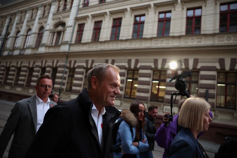 Donald Tusk, the leader of the largest opposition grouping Civic Coalition (KO), walks towards an election convention in Lodz