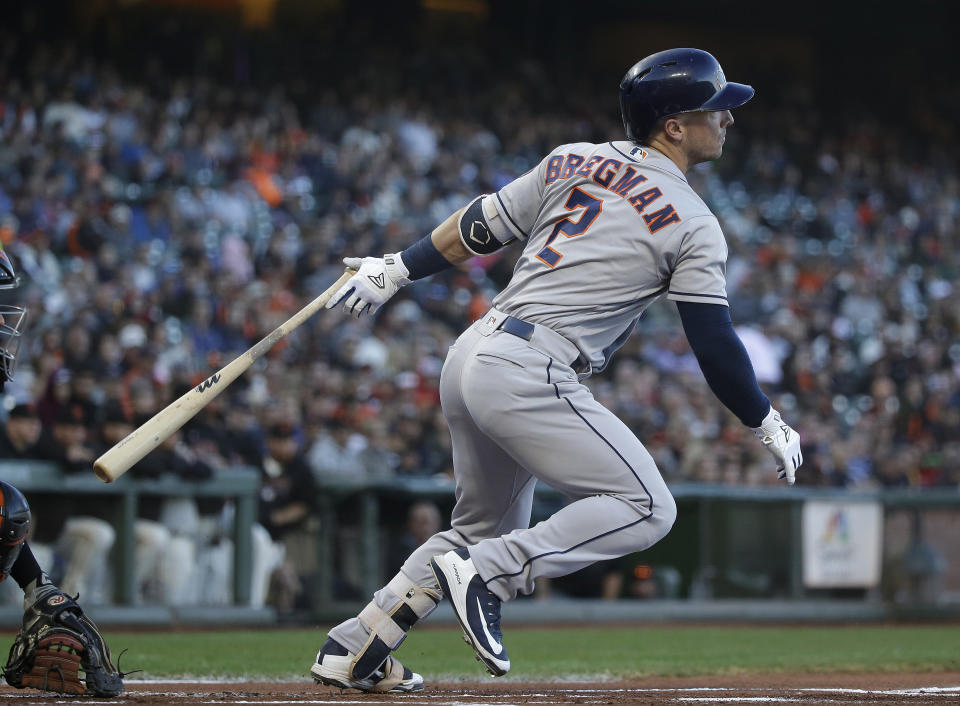 Houston Astros' Alex Bregman hits a single off San Francisco Giants starting pitcher Dereck Rodriguez in the first inning of a baseball game Monday, Aug. 6, 2018, in San Francisco. (AP Photo/Eric Risberg)