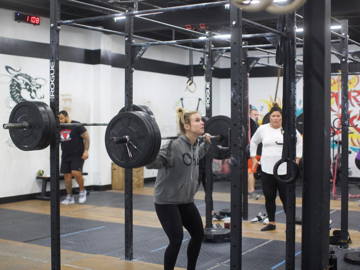 Participants from Marion's Pure Function CrossFit competed against Delaware Fit Factory for the "Raise The Bar" fundraiser benefitting foster care families through Be The Village Marion.