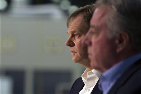 Frank Fischer (L), Volkswagen Chattanooga CEO and Chair, and Gary Casteel (R), United Auto Workers (UAW) Region 8 Director, listen as Retired Circuit Court Judge Sam Payne announces that the union lost its bid to represent the 1,550 blue-collar workers at the Volkswagen plant in Chattanooga, Tennessee February 14, 2014. REUTERS/Christopher Aluka Berry