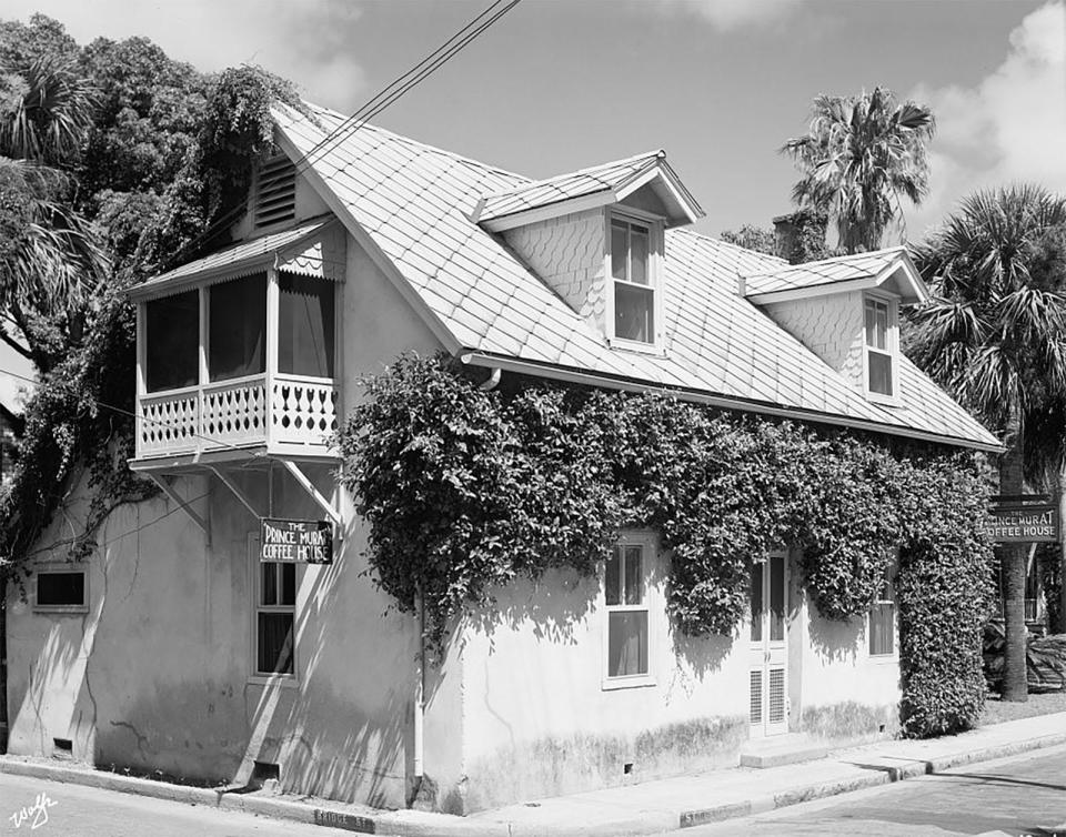 A photograph from the collection of the Library of Congress shows the Prince Murat House, on the corner of St. George and Bridge streets, in 1938. The house was built in 1790 and is now part of The Collector Luxury Inn & Gardens in St. Augustine.