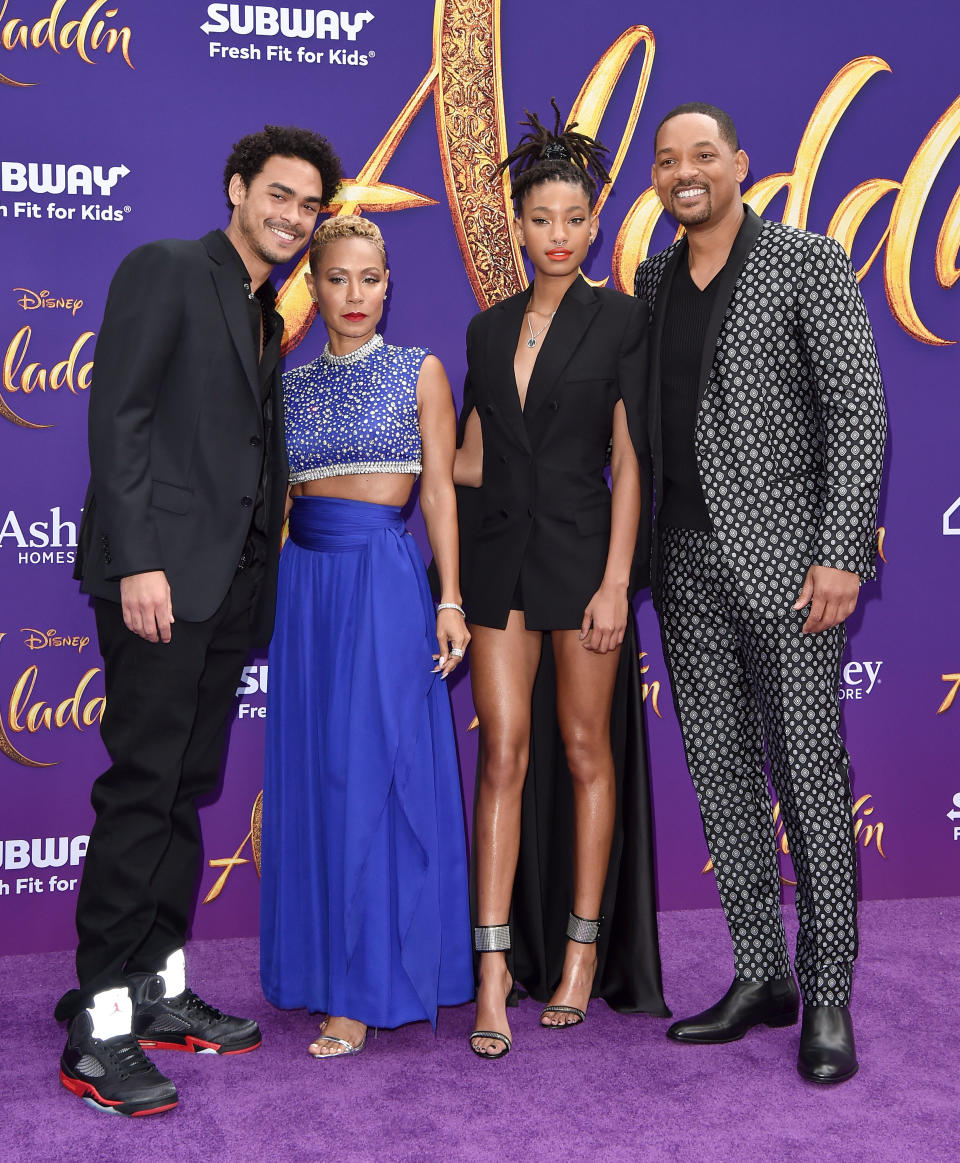 Will Smith and Jada Pinkett Smith with their daughter, Willow [Photo: Getty]