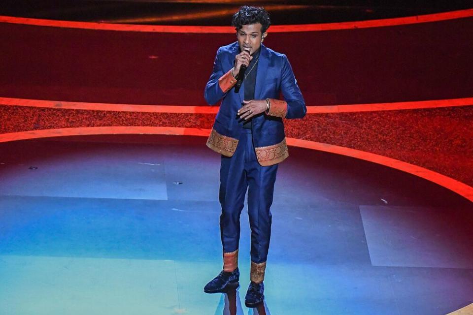 Utkarsh Ambudkar on stage at the 2020 Academy Awards in Los Angeles | MARK RALSTON/AFP via Getty