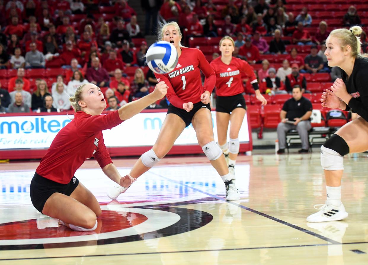 South Dakota's Madison Harms lunges to make contact with the ball during the Summit League Tournament championship match on Saturday, November 27, 2021, at the Sanford Coyote Sports Center in Vermillion.