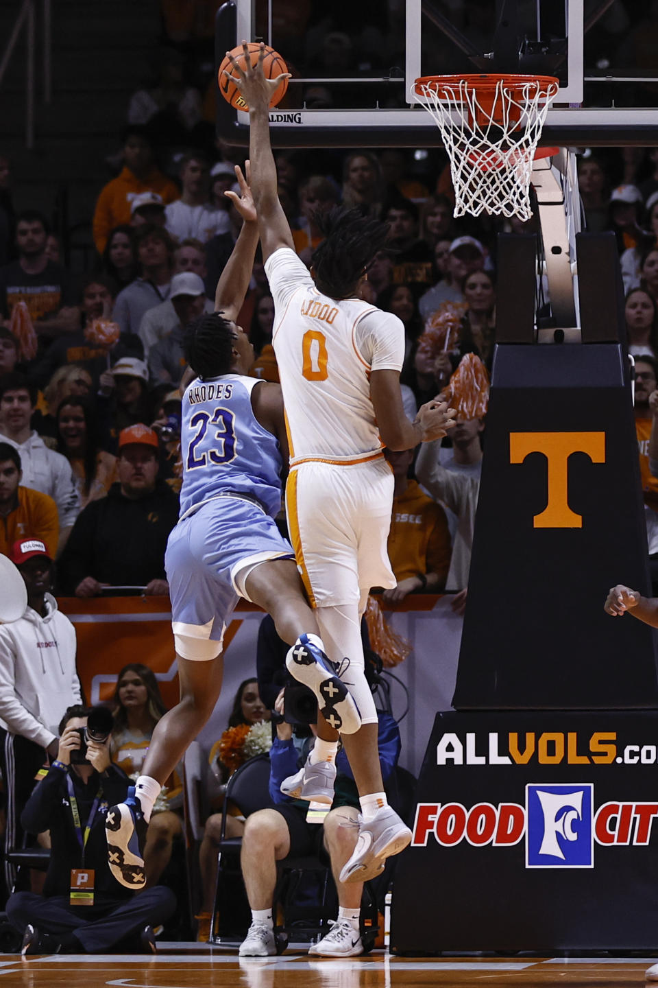 Tennessee forward Jonas Aidoo (0) blocks the shot of McNeese State forward Malachi Rhodes (23) during the first half of an NCAA college basketball game Wednesday, Nov. 30, 2022, in Knoxville, Tenn. (AP Photo/Wade Payne)