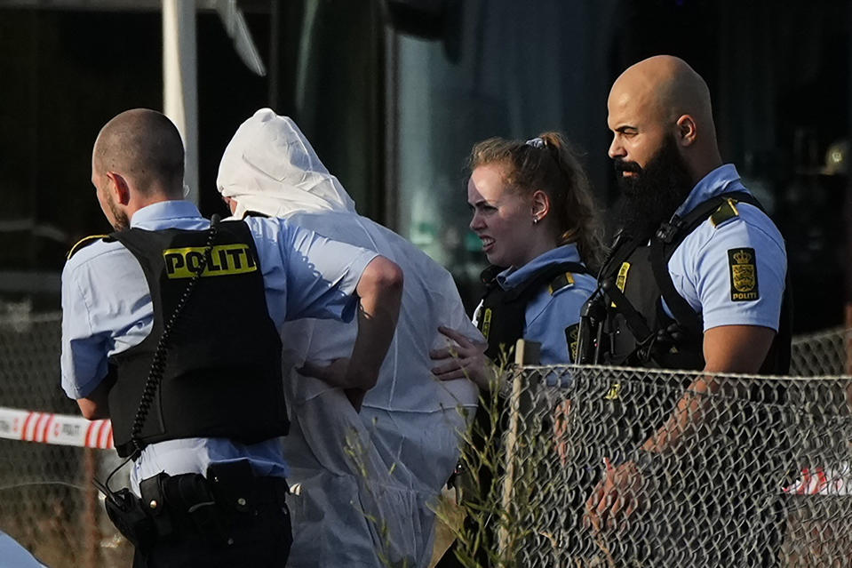 A view of police at Field's shopping center in Copenhagen, Denmark, Sunday July 3, 2022. Danish police say several people have been shot at a Copenhagen shopping mall. Copenhagen police said that one person has been arrested in connection with the shooting at the Field's shopping mall on Sunday. Police tweeted that several people have been hit but gave no other details. (Claus Bech/Ritzau Scanpix via AP)