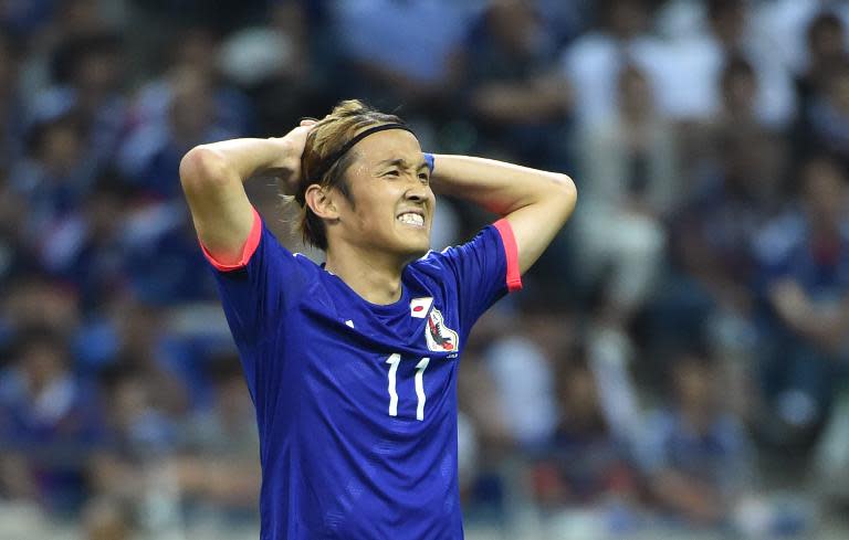 Japan's forward Takashi Usami reacts during the 2018 FIFA World Cup football qualifying match between Japan and Singapore in Saitama on June 16, 2015