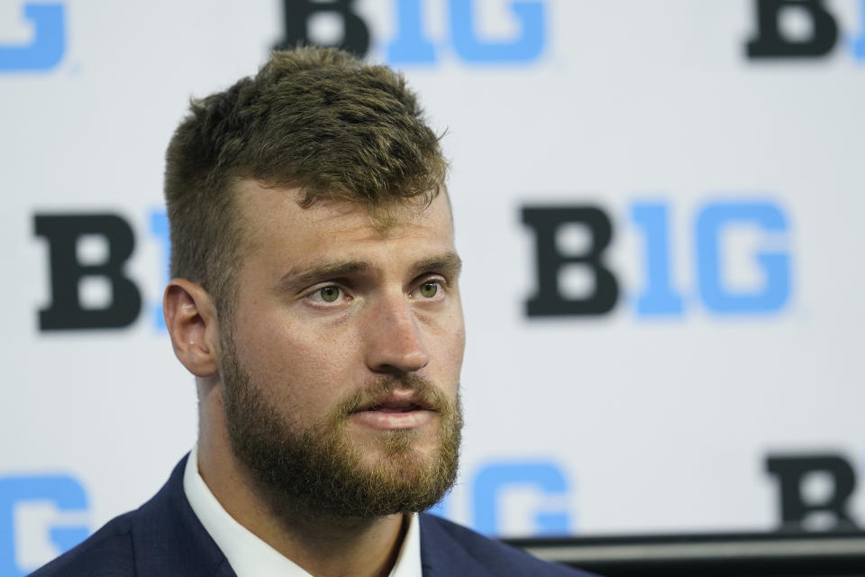 Purdue tight end Payne Durham talks to reporters during an NCAA college football news conference at the Big Ten Conference media days, at Lucas Oil Stadium, Wednesday, July 27, 2022, in Indianapolis. (AP Photo/Darron Cummings)